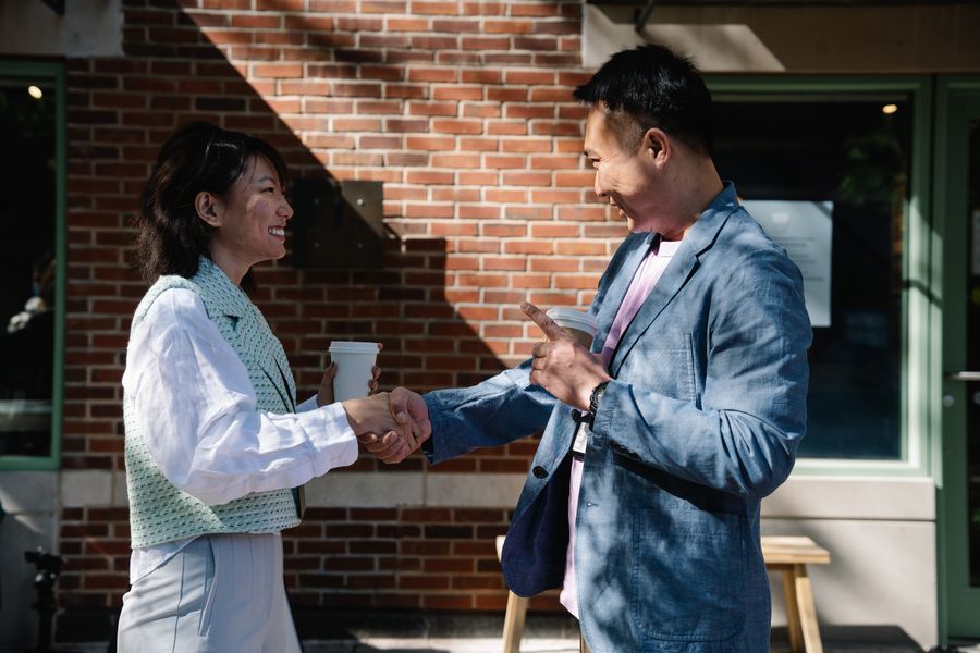 Two business colleagues shaking hands.