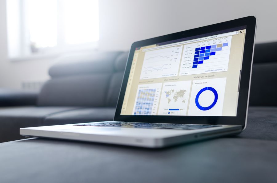 A laptop screen showing a data analytics dashboard.